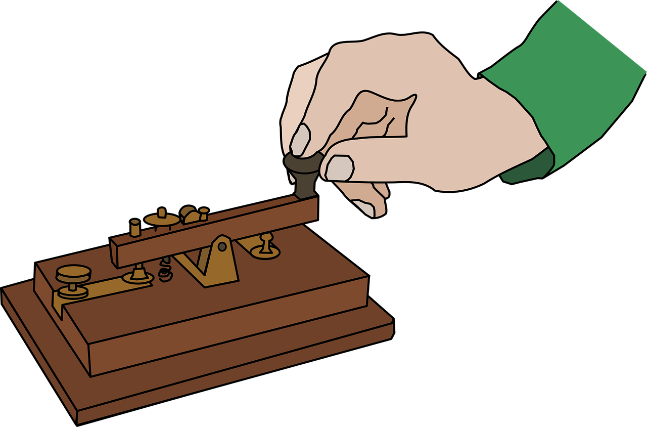 A hand on a telegraph instrument